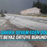 6 dakika devam eden dolu kenti beyaz örtüye büründürdü