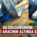 Su doldururken kendi aracının altında ezildi